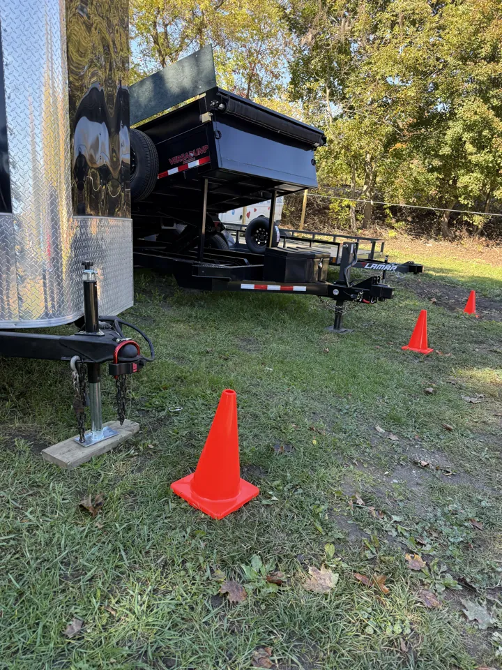 Orange cones marking trailer parking spaces at the Newaygo pickup lot